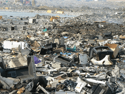 large landfill of e-waste items being improperly discarded