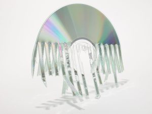 A CD torn apart by a shredder