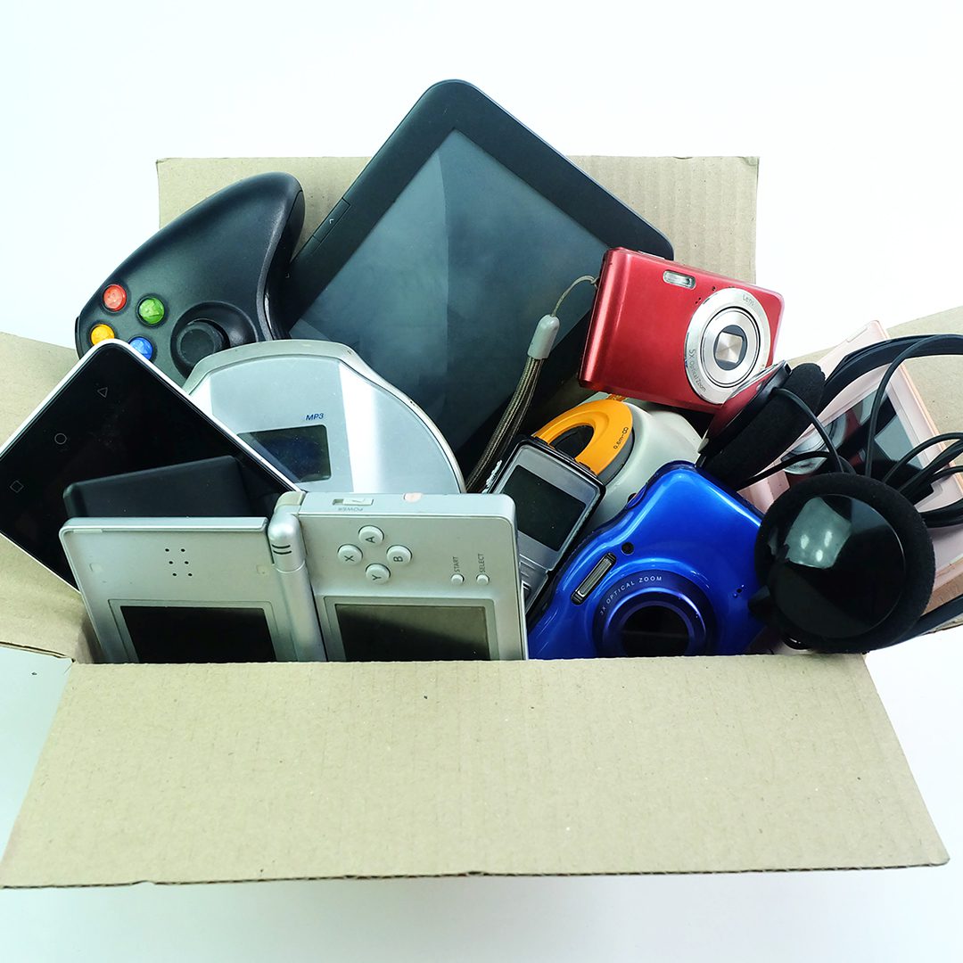 Box of unused or old electronics.