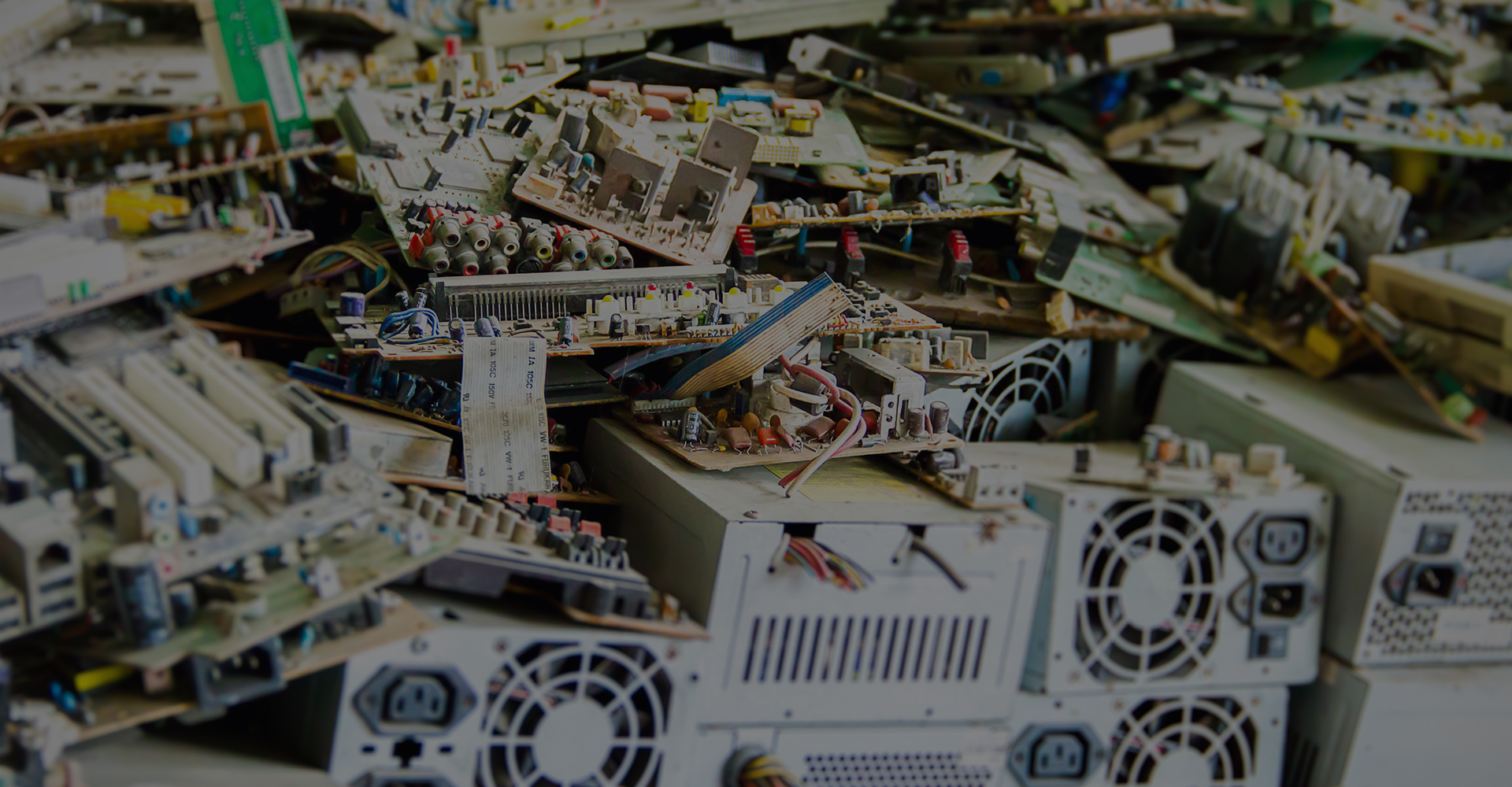 various desktop computers disassembled for recycling